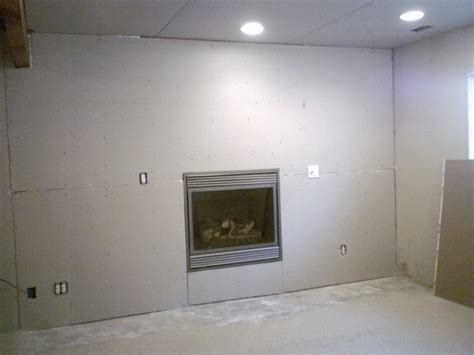 how to finish drywall around fireplace