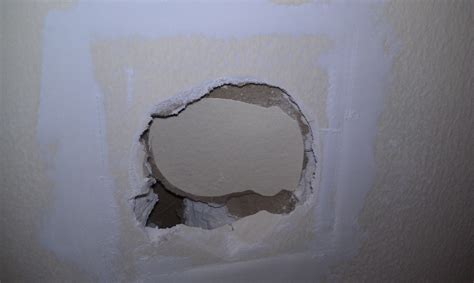 How To Fix A Hole In The Wall With Cardboard