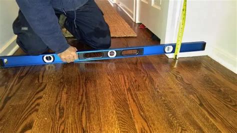 how to fix sloping floors