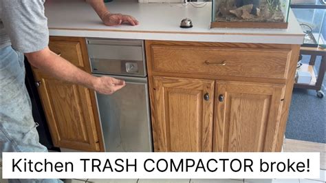 How To Fix Stuck Trash Compactor