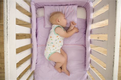 how to get a baby to sleep in cot