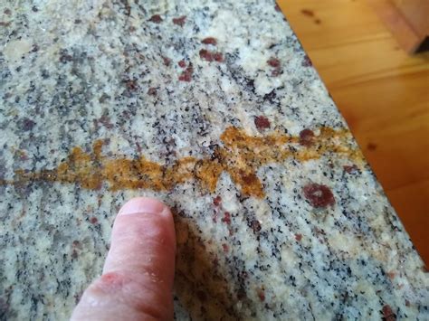Smells Like Food in Here Clean Rust Stain from Granite Countertop
