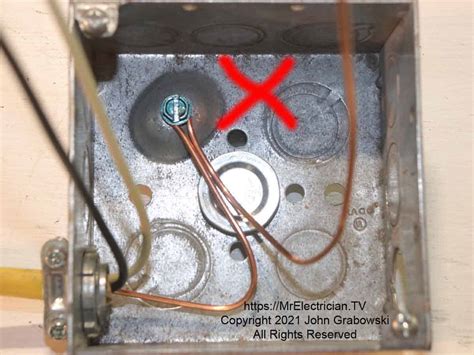 how to ground a wire in a junction box