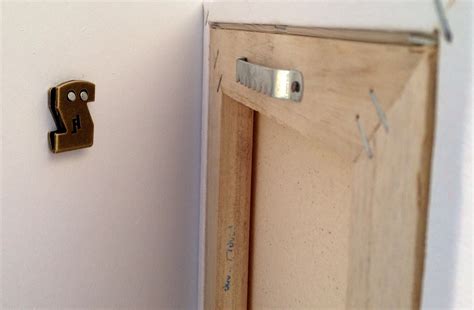 How To Hang A Frame That Doesn't Have Hooks