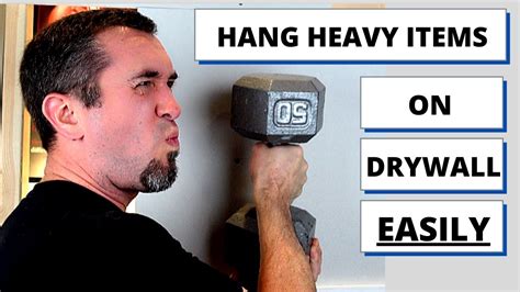 how to hang heavy objects in drywall