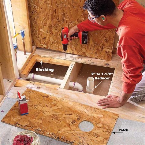 how to install a shower base on a wood floor