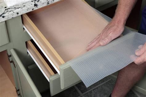 how to keep shelf liner in place