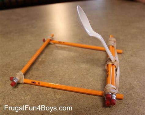 how to make a catapult using rubber bands