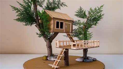 DIY Kid made fairy tree houses. Fun art activity using