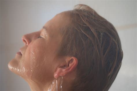 How To Not Get Water In Ears While Showering