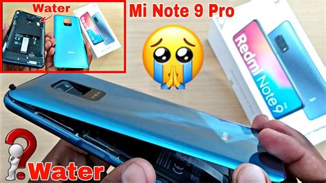 how to open back cover of redmi 9
