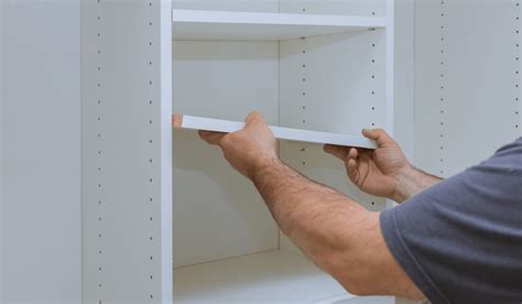 how to put a shelf in a cupboard