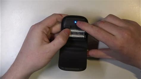 how to put microsoft arc mouse in pairing mode