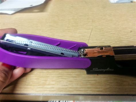 How To Put Spring Back In Stapler