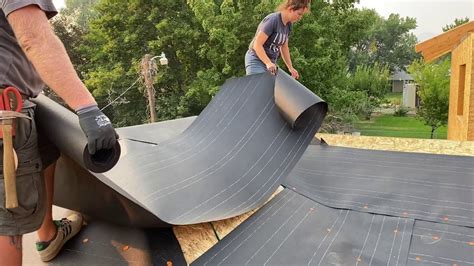 how to put tar paper on a roof