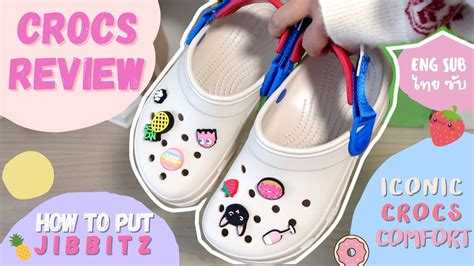 how to put the jibbitz on crocs