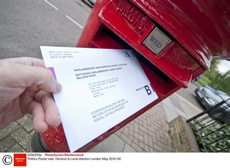 how to register for postal vote uk