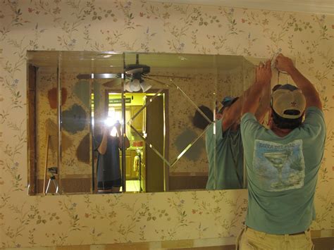 How To Remove A Large Mirror From A Wall