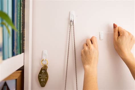 How To Remove Adhesive Hooks From Wall