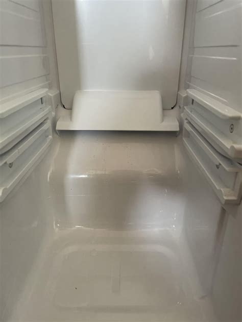 How To Remove Back Panel In Freezer