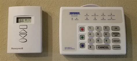 how to remove brinks keypad from wall
