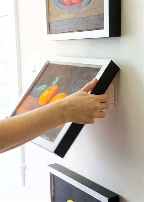 How To Remove Command Strips From Picture Frame