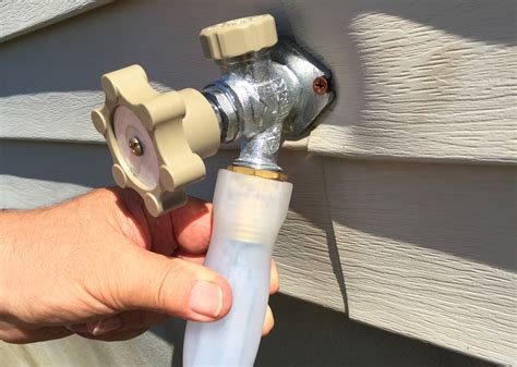 how to remove garden hose connector