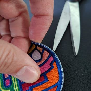 how to remove iron on patch from polyester