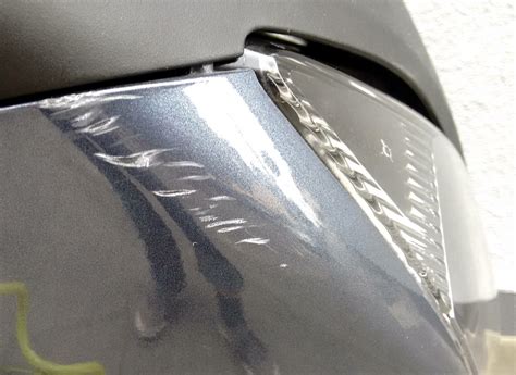how to remove light scratches from motorcycle windshield