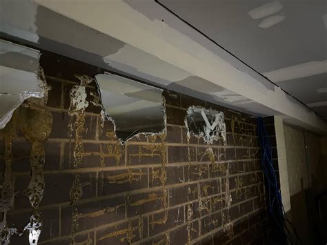 How To Remove Mirror Glue From Brick