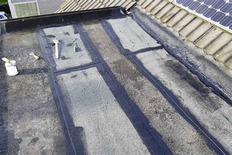 how to repair a flat roof in the rain