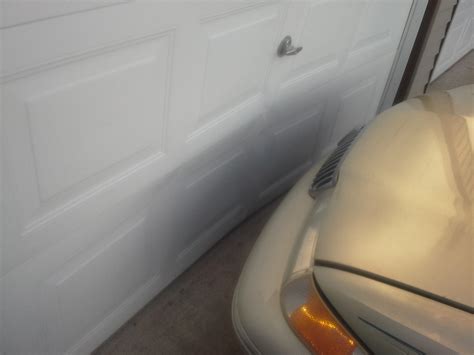 how to repair dent in metal garage door