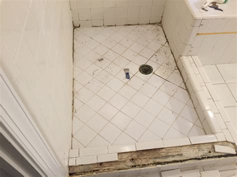 how to replace shower floor tile