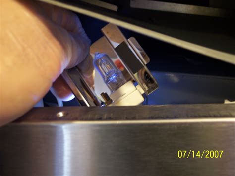 How To Replace The Lightbulb In A Ge Microwave