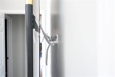 How To Secure A Leaning Mirror To The Wall