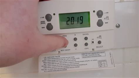 how to set the time on a danfoss fp715si