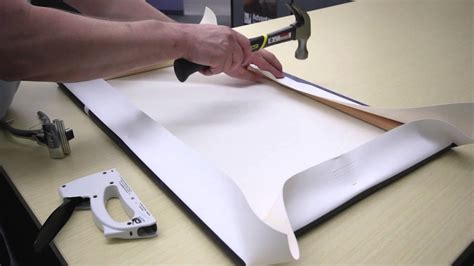 how to stretch fabric over a canvas frame