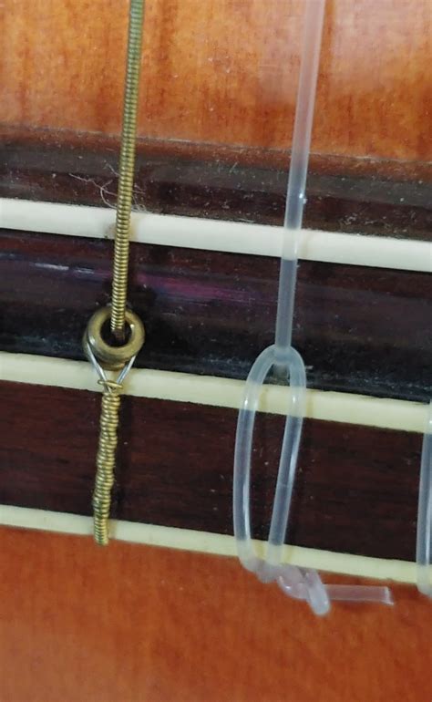 How To String A Classical Guitar With Ball End Strings