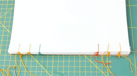 How To Tie Papers Together With String