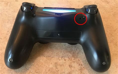 how to use reset button on ps4 controller