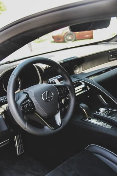 An open trunk, boot in a Lexus car on display in a Lexus showroom Stock