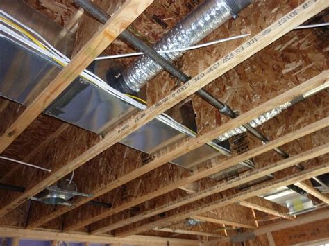 hvac vent ducts holes in floor joists