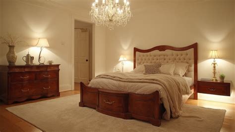 illuminate with warm lighting in bedroom with oak furniture