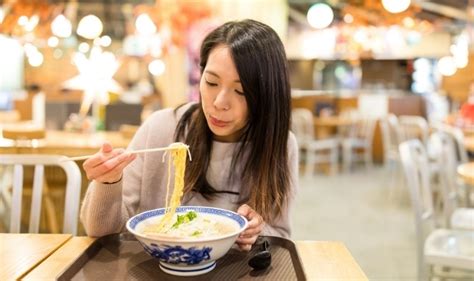 image of a family eating ramen