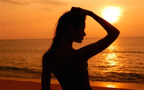 images of women at sunset