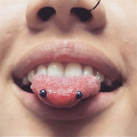 infected snake eyes tongue piercing