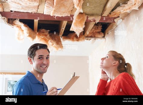 inspecting roof damage