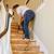 installing hardwood flooring at top of stairs
