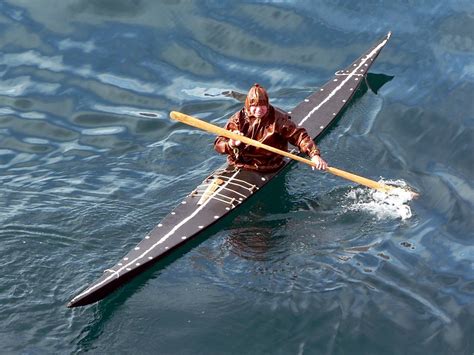 Inuit Model Kayak ca. 1920 Complete with Carved Wood Face Paddler in