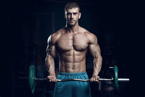 Hard Core Bodybuilding. Muscular Athletic Bodybuilder Fitness Model